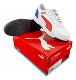 Tenis Puma Rebound JOY Lo Blanco Azul y Rojo Infantil